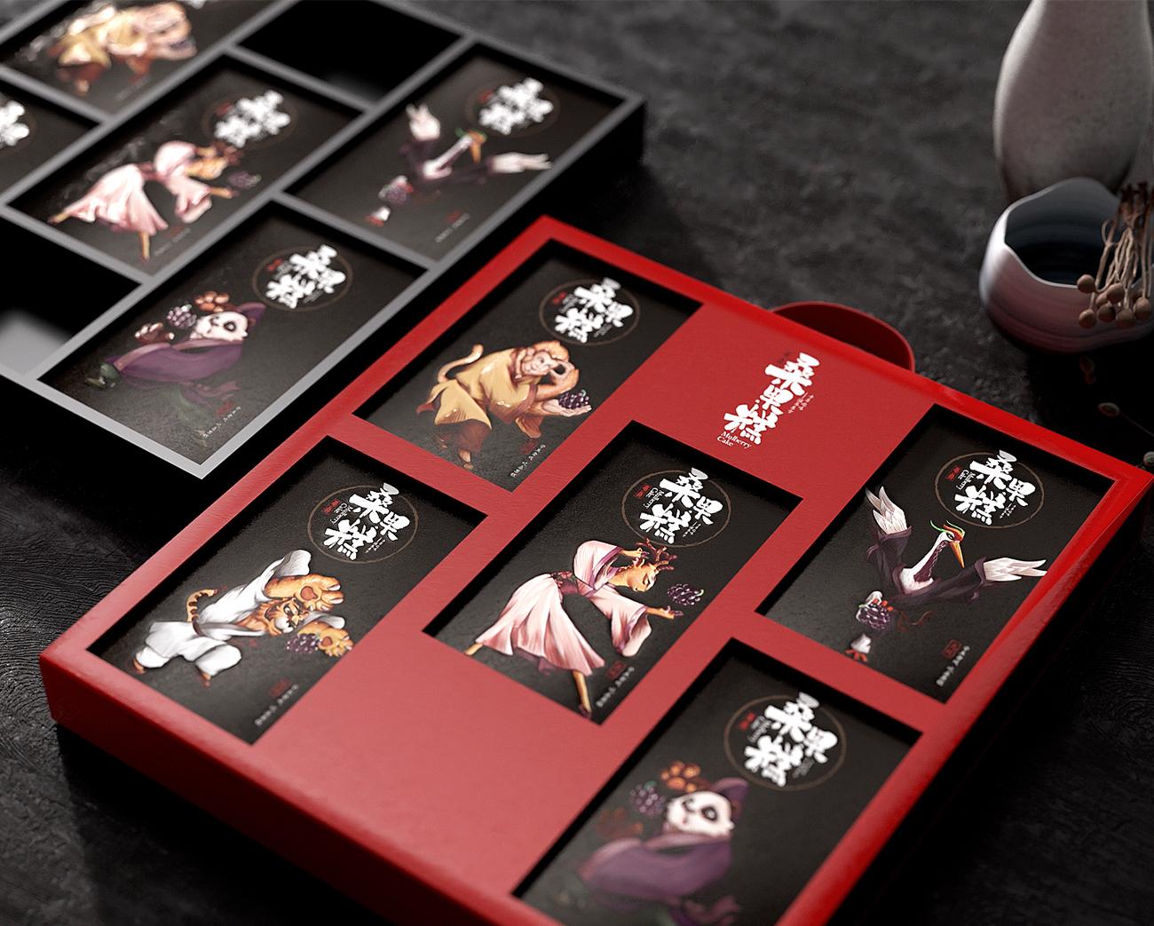 Open red and black rigid gift box holding five individual mulberry confectionery cartons in fitted compartments